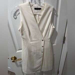 Sleeveless Ivory Pleated-Accent Dress